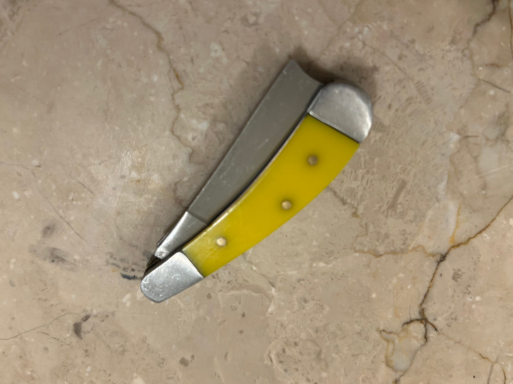 SS...TC RAZOR YELLOW BAKELIGHT HANDLE 2 BLADE STAINLESS STEEL MANUAL VINTAGE KNIFE USED